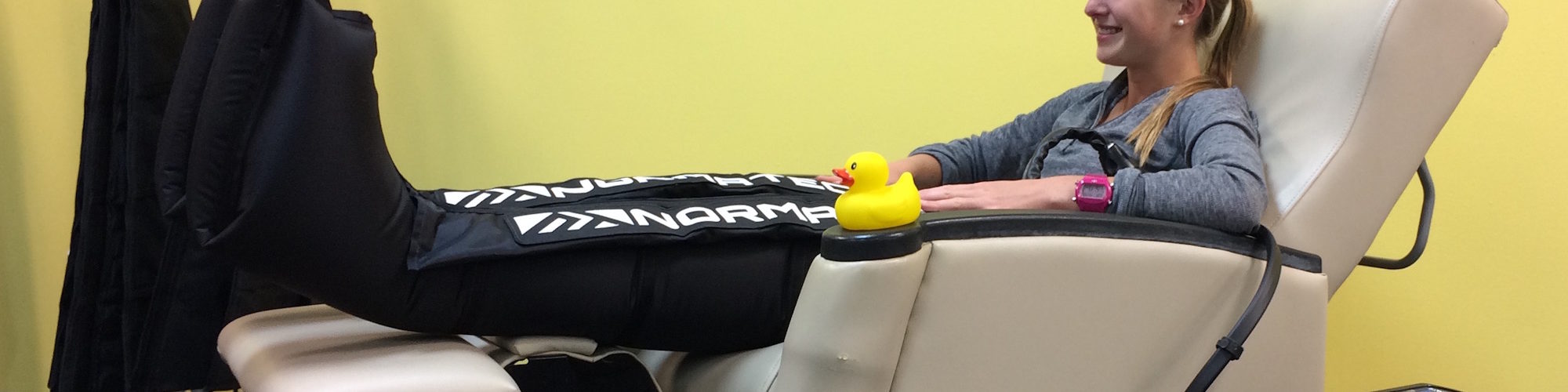 Ann Arbor recovery lounge with sports massage and NormaTec compression boots